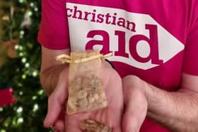 Rev John Stanbridge, minister of Ballycastle Presbyterian Church with the bag of frankincense he is hanging on his Christmas tree this year in a gesture of solidarity with people facing a severe hunger crisis in the countries in the Horn of Africa - Ethiopia, Kenya and Somalia - from where frankincense originates.