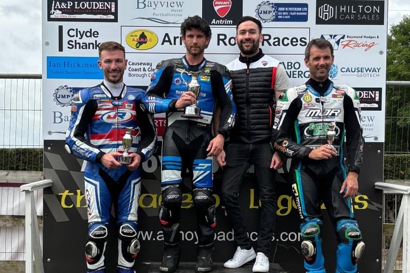 Aaron Lyons, from Ducati Antrim, is pictured with the prize winners of the Next Generation Supersport 2 Race.