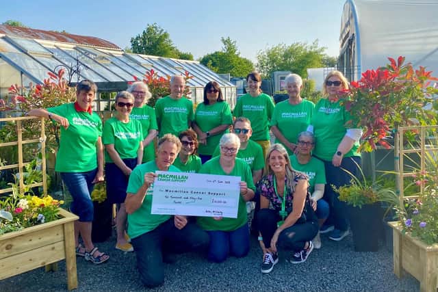 Pictured (L-R) in the front row are Andrew and his wife Carol along with Catherine King, Macmillan Move More Coordinator for Causeway Coast and Glens, supported by local Move More participants. Credit Macmillan Cancer Support