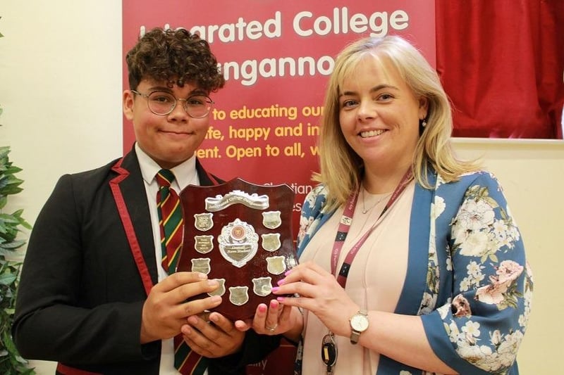 Fionn McMahon receives the Form Tutor Award for class 8PD from Form Teacher, Miss Paula Daly. Credit: Ita Darragh