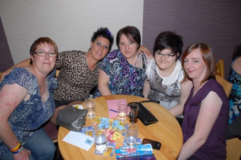 Nora Brown, Michelle Cahoon, Sarah Nixon, Cathryn Smyth and Lisa Burns enjoying the quiz in the Olderfleet Bars for MacMillan Cancer Support in 2010.