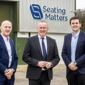 Pictured with Economy Minister Conor Murphy are George McKinney, Invest NI (left) and Martin Tierney, Seating Matters (right). CREDIT EXECUTIVE OFFICE