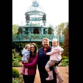 James & Ashleigh McConkey with children Ella and Amelia, who were among the first visitors to the Coronation Garden.