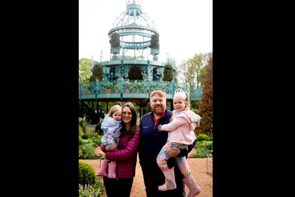 James & Ashleigh McConkey with children Ella and Amelia, who were among the first visitors to the Coronation Garden.