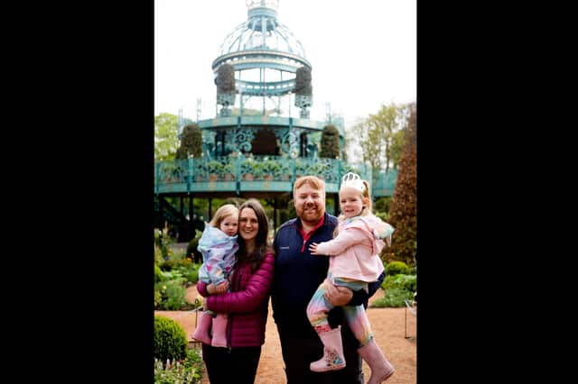 James & Ashleigh McConkey with children Ella and Amelia, who were among the first visitors to the Coronation Garden.