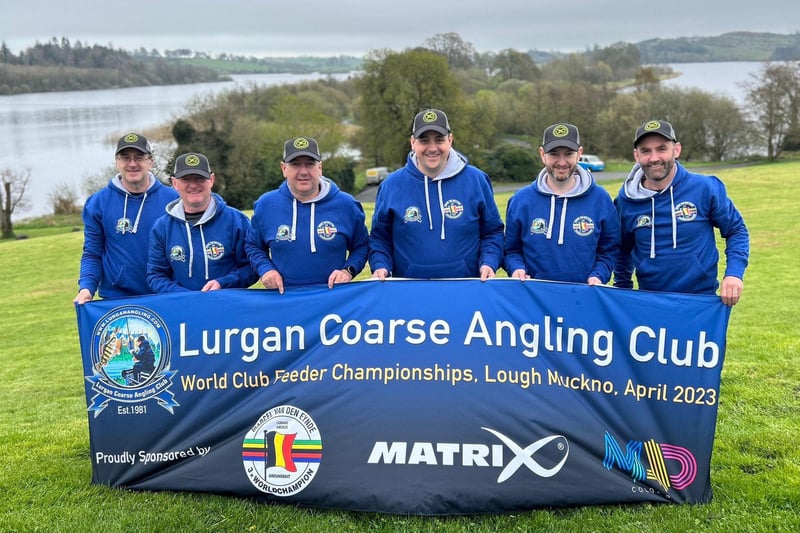 Lurgan Coarse Angling Club members accept the new banner after winning the World Club Feeder Championships in Muckno, Castleblayney, Co Monaghan at the weekend.