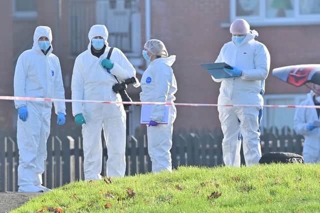Police at the scene of the murder in Lurgan. Picture: Pacemaker