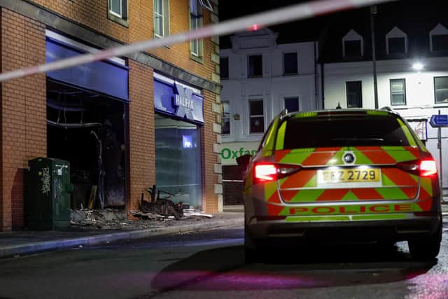 Police at the scene of the fire at the Halifax premises in Portadown on Tuesday night. Picture: Press Eye