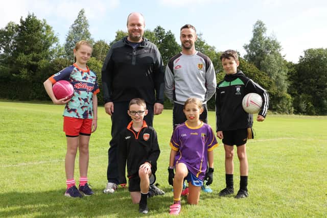 Children welcomed Down Senior Football Manager Conor Laverty to the Lisburn and Castlereagh City Council GAA summer camp. Pic credit: Lisburn and Castlereagh City Council