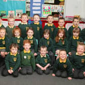 TWO DOZEN. Pictured full of smiles on Friday are P1 pupils from St Brigid's PS Ballymoney in 2007