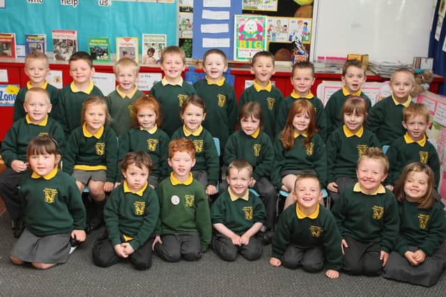 TWO DOZEN. Pictured full of smiles on Friday are P1 pupils from St Brigid's PS Ballymoney in 2007