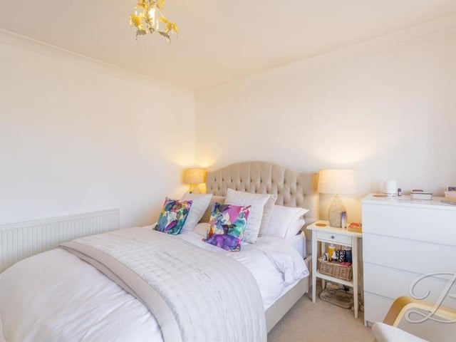 And so we move on to the five bedrooms. The first two are bigger than the other three, beginning with this one, which has a large bay window overlooking the front of the property.