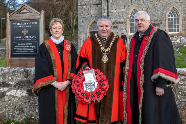 Councillor Joan Baird; Mayor of Causeway Coast and Glens Councillor Ivor Wallace and Councillor Alan McLean  at a service of remembrance on Rathlin Island