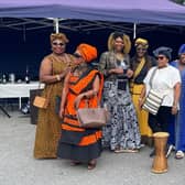 Wonderful style and native costumes at a Portadown estate's multi-cultural street party with food, music and fun from across the globe.
