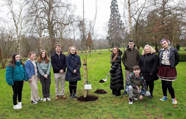 To mark the tenth anniversary of Care Day, Armagh City, Banbridge and Craigavon Borough Council held a special tree planting ceremony at the Palace Demesne, Armagh recently. Pictured at the event was Lord Mayor of Armagh City, Banbridge and Craigavon, Councillor Sarah Duffy, Geraldine McGuigan and young people from VOYPIC, with Councillors Jessica Johnston and Peter Lavery.