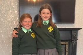Hollie and Esmé Curran who started Tannaghmore Primary School in Lurgan, Co Armagh. They moved from Scotland in the summer holidays and it’s their first day at their new school. Both are 'absolutely buzzing'.