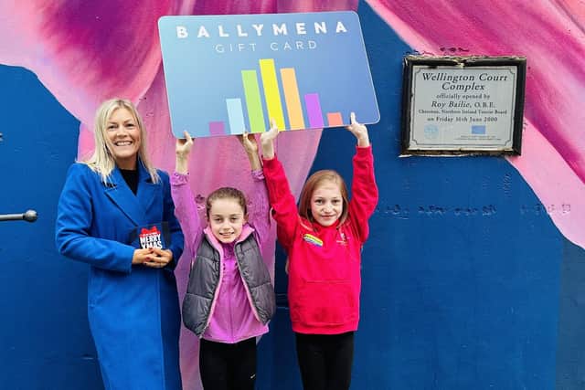 Kathy Croskery, Win Your Dream Christmas winner, with daughters Lucy and Carly. Photo submitted by Ballymena BID