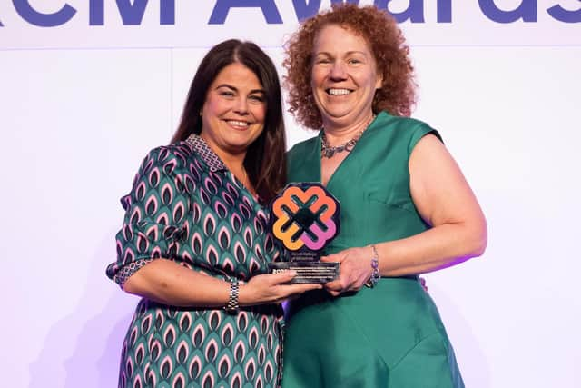 Susan Stitt and Jacqueline Dorrian with their award