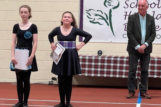 Showing off their awards certificate are two of the Sollus School of Highland Dancers. Credit: Jillian Lennox