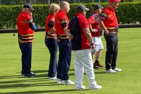 Lurgan B bowlers anxiously awaiting the delivered bowl during their math at home to Portadown