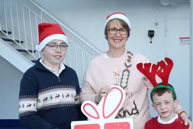Pictured are Michael Delargy, mum Rosemary Delargy, and Sean Martin Delargy from Cushendall.