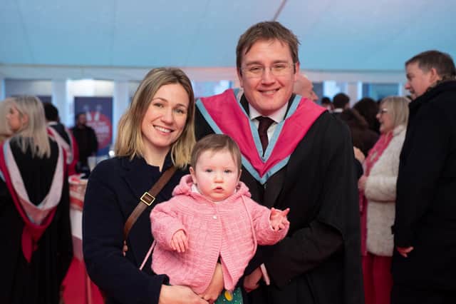 David Auld who graduated with a Masters in Business Administration pictured with his wife Emily and their eight-month-old daughter Zoe.