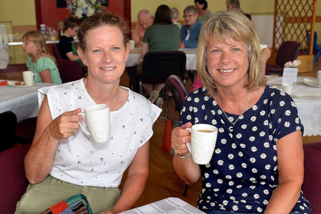 Catching up at the Thomas Street Methodist Youth Fellowship coffee morning are Lynne Fenton, left, and Jill Richardson. PT26-213.