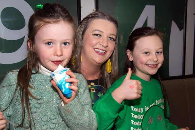 Having fun at the Tír Na nÓg GFC St Patrick's Day Party on Sunday are, Colette Murphy and her daughters, Oona (7) and Eva (10). PT12-225.