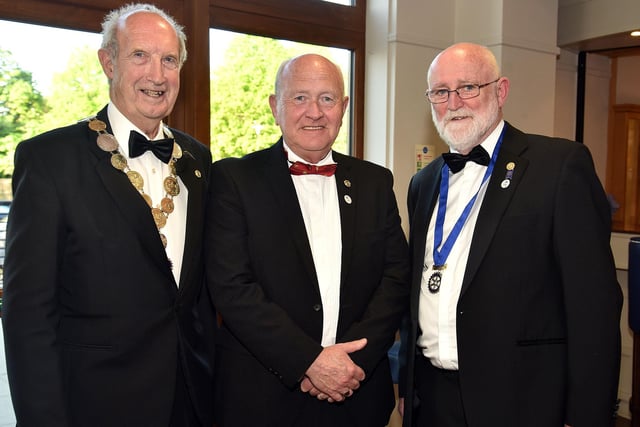Arnold Hatch, left, President of Portadown Rotary Club, who hosted the charity dinner at the Seagoe Hotel, with Kevin Powell, Assistant Governor, District 1160, and Captain Sean FitzGerald, District Governor. PT19-221.