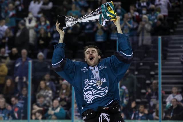 Sam Ruopp celebrates winning the Challenge Cup at the SSE Arena, Belfast, during the 2021/22 season. Ruopp has announced that he leaving the Giants after two years for German side Lausitzer Füchse. Photo by William Cherry/Presseye