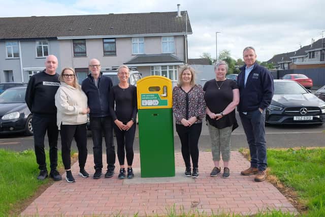 Coolnafranky Park Residents’ Group at the site of the new defibrillator with the Housing Executive’s Shane Conlon.