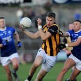 Crossmaglen's Oisin O'Neill drives past Clan's Michael McConville