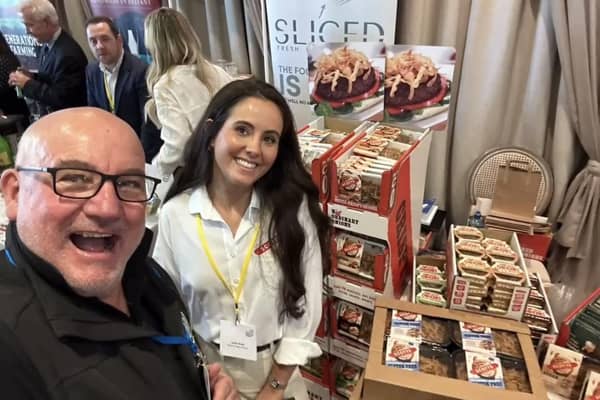 Marcus Carter of Artisan Food Club pictured with Jodie Brown, sales and marketing manager of Scott’s Crispy Onion. Credit Scotts Crispy Onions