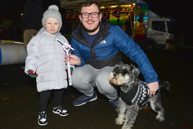 Lochlain and pet dog Rocco enjoying the lights at Crumlin Switch On