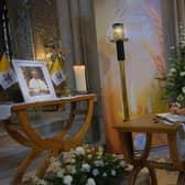 Lord Mayor of Armagh City, Banbridge and Craigavon, Councillor Sarah Duffy signs the Book of Condolence at the Memorial Mass for Pope Francis in Armagh Cathedral.
