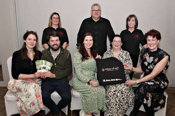 Causeway Coast & Glens Heritage Trust staff and members of the Économusée Network in N.I.  Front L-R: local artisans Becky and Charlie Cole of Broughgammon, Leona Kane of Broighter Gold, and Geri Martin of the Chocolate Manor with Brona Steenson of Steensons Jewellers.  Back row L-R, from the Causeway Coast & Glens Heritage Trust Tiérna Mullan, Graham Thompson and Carole O'Kane at the 3rd International Économusée Conference hosted by the Causeway Coast & Glens Heritage Trust at the Marine Hotel, Ballycastle.