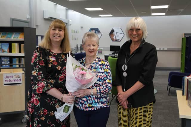 From left to right – Branch Library Manager Donna Orr is pictured alongside Pat who was the first customer through the door and Area Manager for Libraries NI, Fiona McCallum.