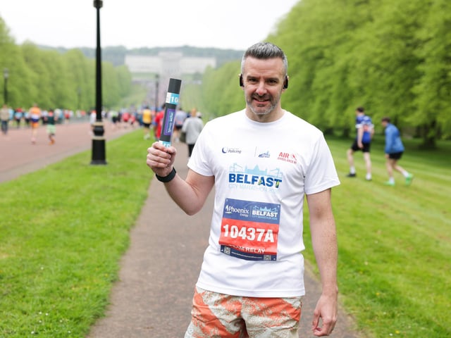 PSNI Assistant Chief Constable Bobby Singleton take part in the Phoenix Energy Belfast City Marathon leaving the grounds of the Stormont Estate.