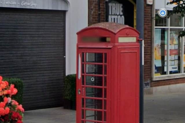 A traditional red phone box. Photo by Google