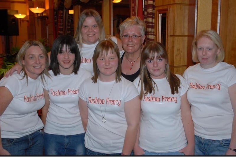 Compere Pat Robinson with some of the Larne Ladies Hockey Club organisers of Fashion Frenzy in the Highways Hotel in 2007. LT17-336-PR
