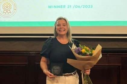 Cathy pictured with her award