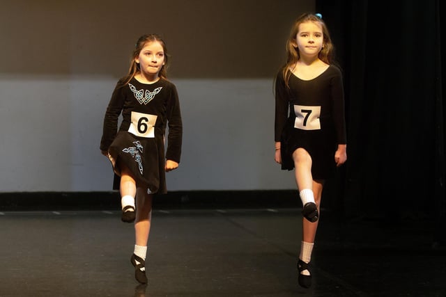 Stepping out in the under 8 years Light Double Jig competion at Portadown Town Hall on Saturday are, Evie McCaffrey, left, and Zara Bannon. PT10-220.