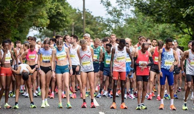 Runners prepare for the start of the elite race on August 27.