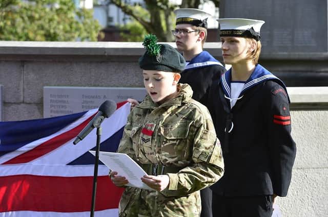 Cadets read out the 43 additional names of the fallen which have been added to the memorial.