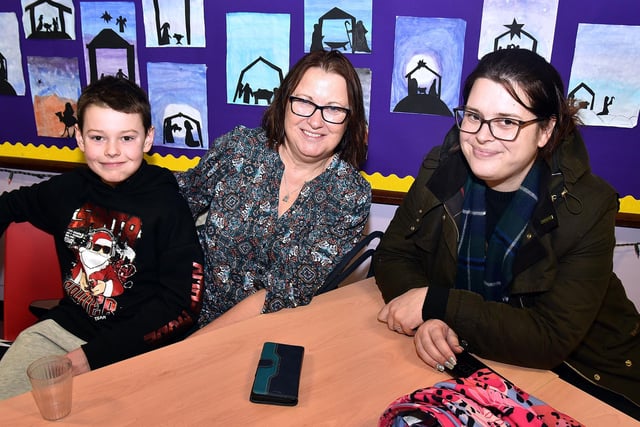 Having a great time at The Cope Primary School, Loughgall, festive afternoon are, from left, Alfie Morton (9); granny, Sue Coulter, and mum, Katie Morton. PT51-210.