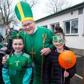 Local character, 'Big Pat' who took on the role of the patron saint at the  Derrymacash St Patrick's Day parade pictured with Kelsie Lethem (8), left, and Darcy Goff. LM12-233.