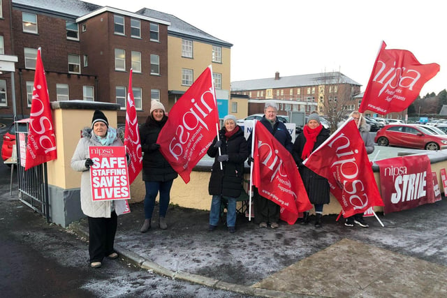 Health workers on the picket line outside Lurgan Hospital on Monday. Workers were on a 24 hour strike over pay.