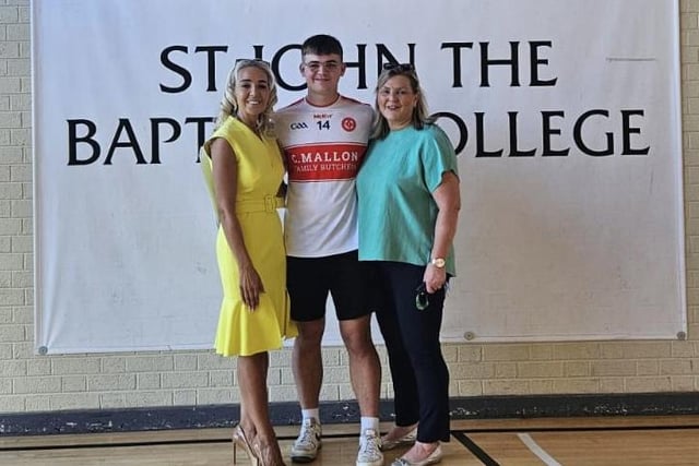 St John the Baptist's College Principal Mrs Noella Murray pictured with Daire Walsh and his mum Catriona after achieving highly in his GCSE results.