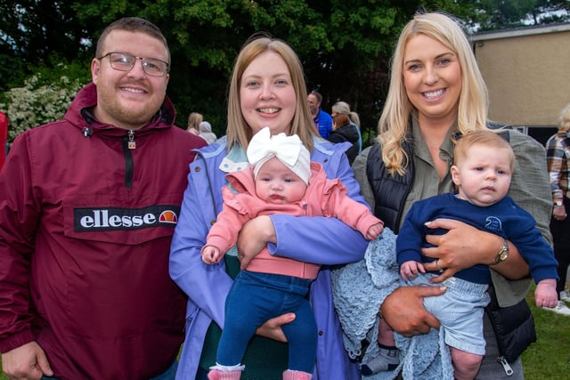 Having a great night out at the Loughgall Community Fun Night are from left, Scott and Lynsey Ritchie with daughter, Abbie (4 months), Christine McCrabbe and son Elliot (3 months). PT24-205.