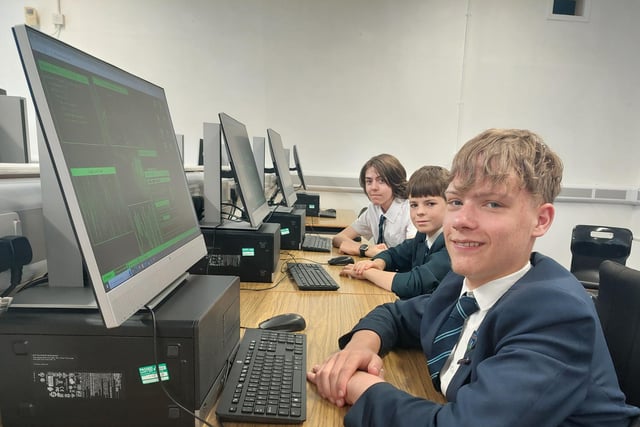 Ethan Pollock, Luke Sloan and Calvin Morrison from Ballymoney High School who were learning about how to keep safe online and stay protected from hackers at the Computing workshop at Northern Regional College. Credit: NRC